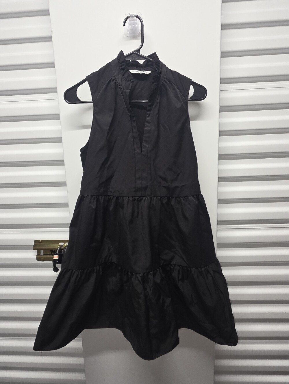 Black Sleeveless Tiered Ruffle Mini Dress Minimalist Quiet Luxury Monochrome